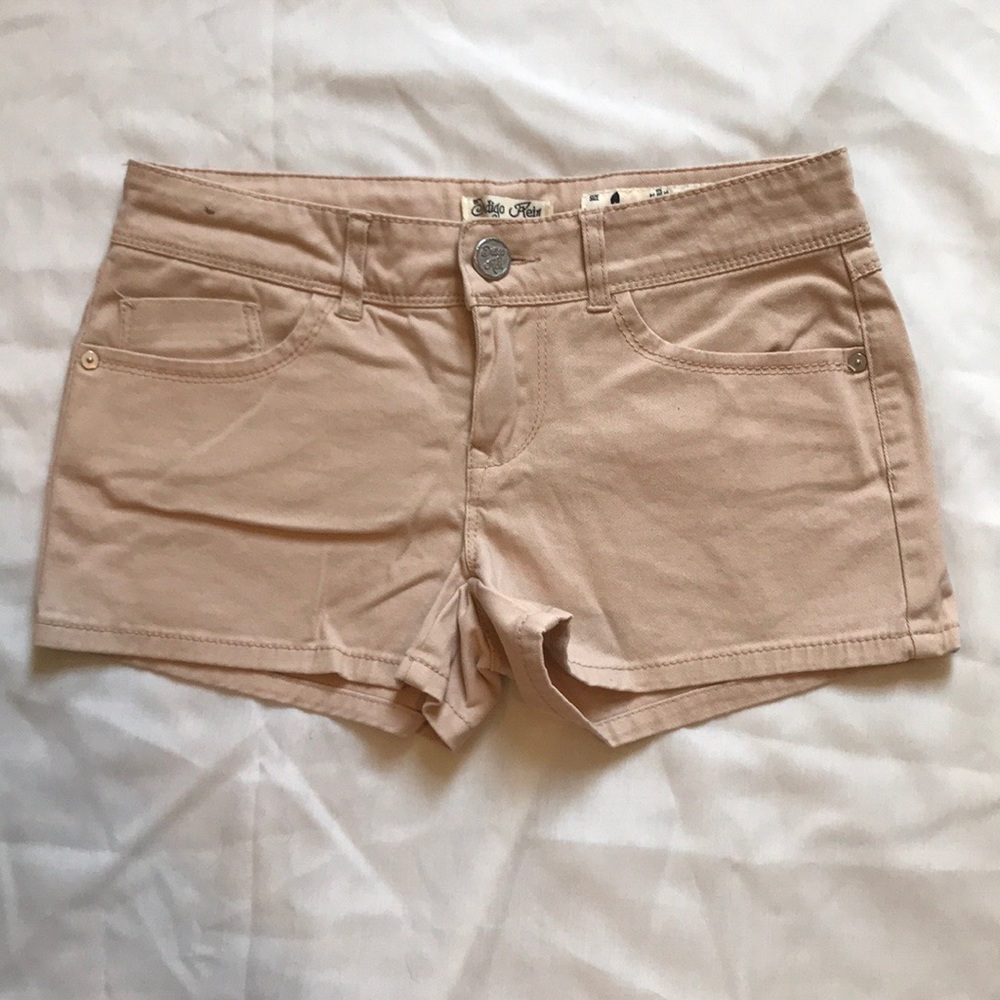 Indigo Rein, light pink shorts